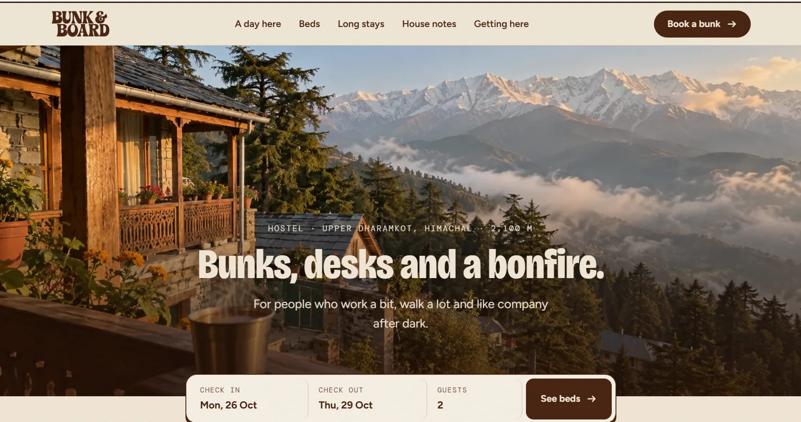 Bunk & Board website homepage: chai on a balcony facing the Himalayas, with a booking bar